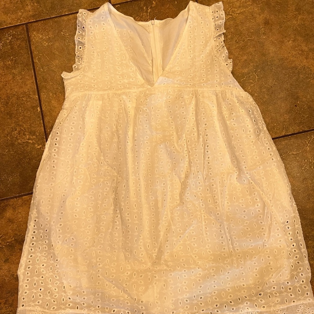 Brand new, White size small dress/romper with shorts underneath.